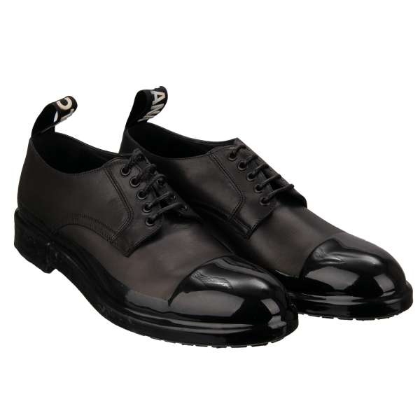 Leather derby shoes with liquid rubber cover and DG logo on the back in black by DOLCE & GABBANA