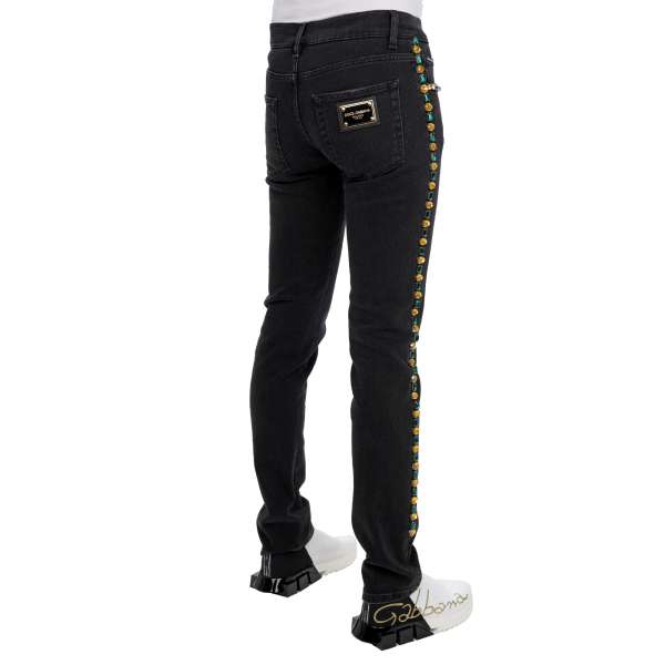 5-pockets Jeans SKINNY with DG logo metal plate and crystal decorations in black by DOLCE & GABBANA