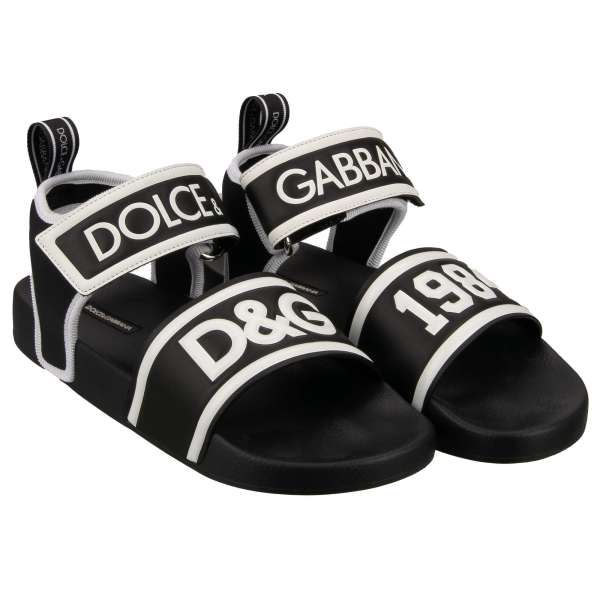 Slides Straps Sandalen mit D&G Logo 1984 vorne in schwarz und weiß von DOLCE & GABBANA